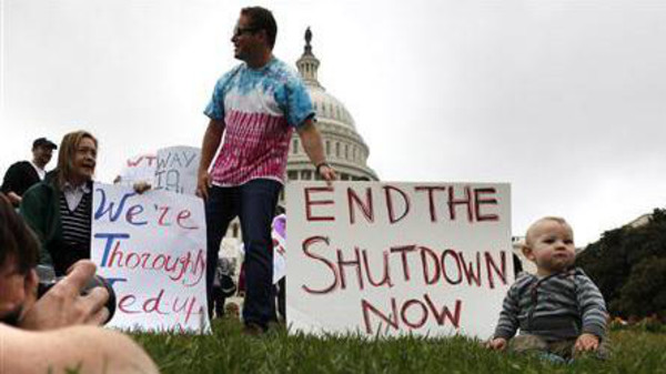 Federal workers demonstrate for an end to the U.S. government shutdown on the west front of the U.S. Capitol in Washington