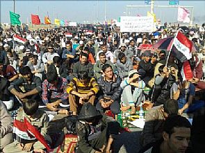 العراق : اشتباكات واعتقال نائب ومقتل شقيقه والمالكي يهدد