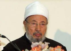 القرضاوي: سأبقى في قطر وسأدفن فيها