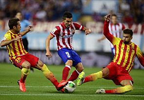 لقب الدوري الاسباني بين برشلونة واتليتكو