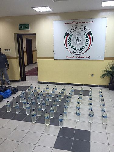 ضبط ‘هندي’ بـ 57 زجاجة خمر في المهبولة