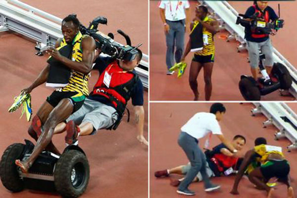فيديو: ارتطام مصوّر بالعداء بولت أثناء احتفاله بفوزه بذهبيّة 200 متر