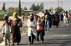 وصول اول دفعة من اللاجئين السوريين لبريطانيا