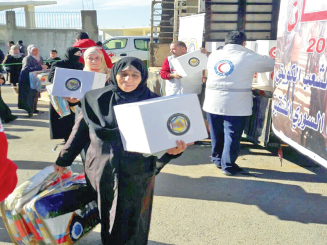 «الهلال الأحمر» توزع مساعدات على أسر سورية نازحة في لبنان