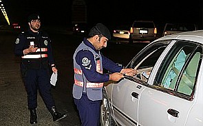 موظفة بالداخلية تهدد رجال الأمن