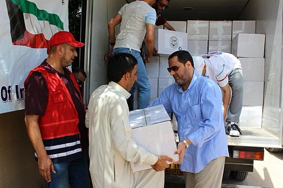 الكويت تواصل مساعدة الاسر النازحة بالبصرة