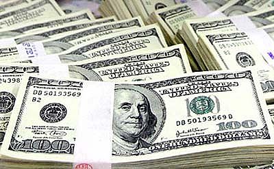 الدولار يرتفع أمام الدينار عند مستوى 302ر0