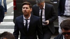 Barcelona's Argentine soccer player Lionel Messi arrives to court with his father Jorge Horacio Messi to stand trial for tax fraud in Barcelona
