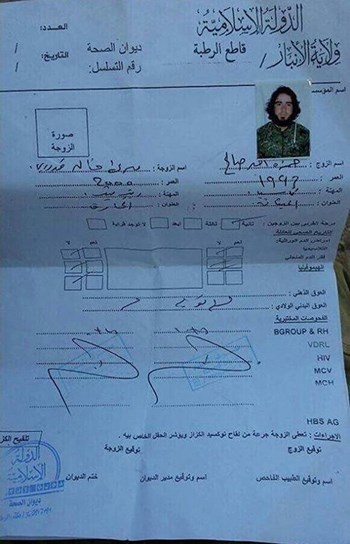 بالصور.. عقد زواج طفلة عراقية من “داعشي”