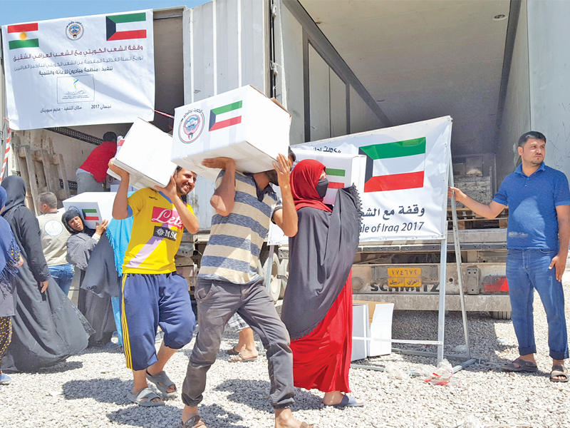 الكويت توزع 135 طناً من الأغذية على نازحي الموصل