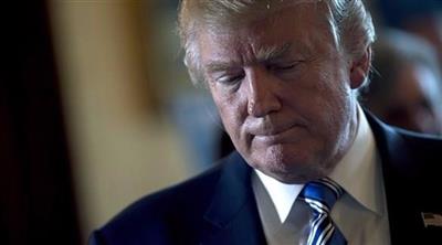 ترامب يبقي على الاتفاق النووي مع إيران