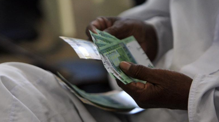 السودان يعلن تخفيض الجنيه السوداني بمقدار الضعفين مقابل الدولار