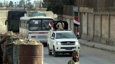 سوريا: عشرات المسلحين والرهائن يغادرون دوما