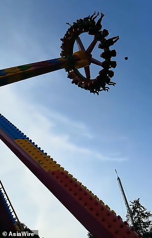 باروكة رجل تسقط من على رأسه لركوبه لعبة ملاهى خطيرة