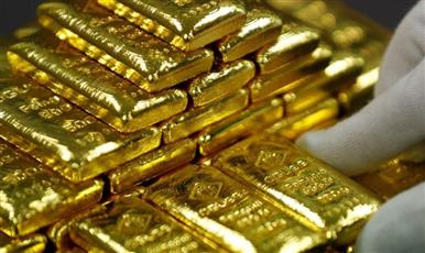 الذهب يتراجع مع تعزز الإقبال على المخاطرة بفضل آمال التجارة