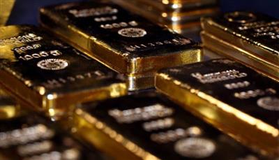 الذهب يصعد مع تراجع الدولار وترقب قرار المركزي الأمريكي