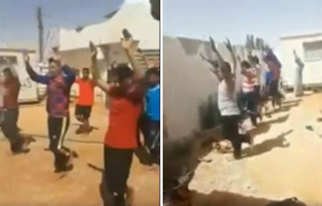 بالفيديو..شاهد: تعذيب عمال مصريين في ليبيا وإجبارهم على الوقوف حفاة تحت أشعة الشمس