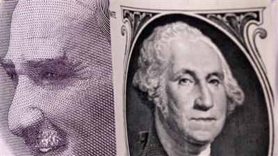 انخفاض قياسي لليرة التركية مقابل الدولار