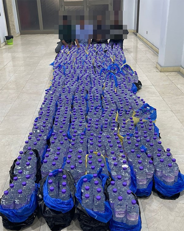 ضبط 4 وافدين بحوزتهم 805 زجاجات خمر محلية