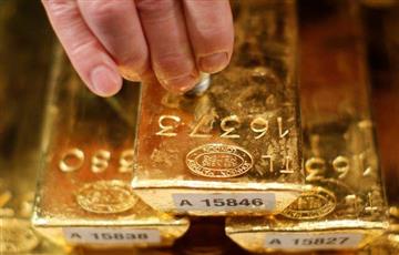 الذهب يتراجع بعد تسجيل أعلى مستوى في أكثر من شهر